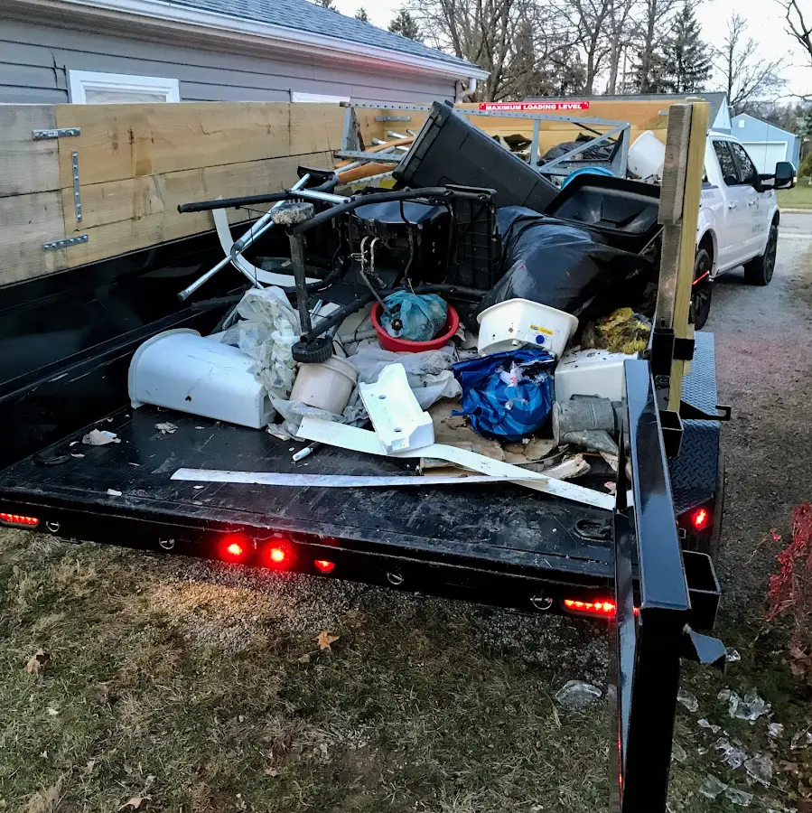 Roll-off dumpster delivered to a residential driveway in Madras